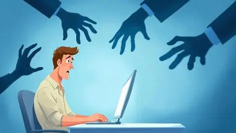 Realistic person concerned at computer shadowy hands online threats